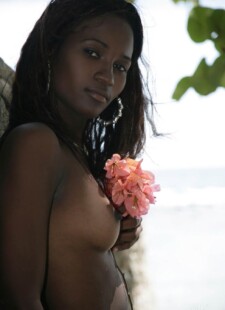 Ebony hottie Jessica posing topless beach 02
