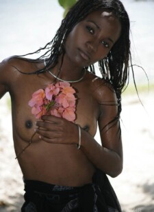 Ebony hottie Jessica posing topless beach 03